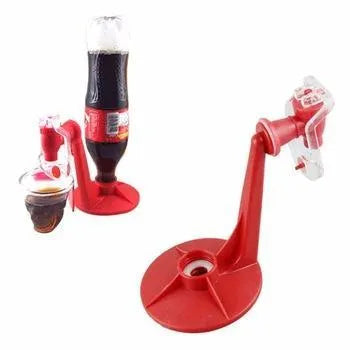 Red plastic Magic Tap soda dispenser attached to inverted 2 litre bottle