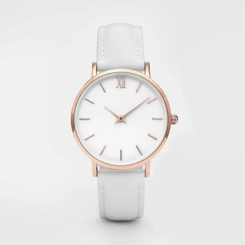 Square-faced quartz watch with an alloy case and PU leather strap on a wrist.