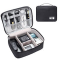 Black or grey waterproof travel cable organiser bag open to show mesh pockets and removable padded dividers