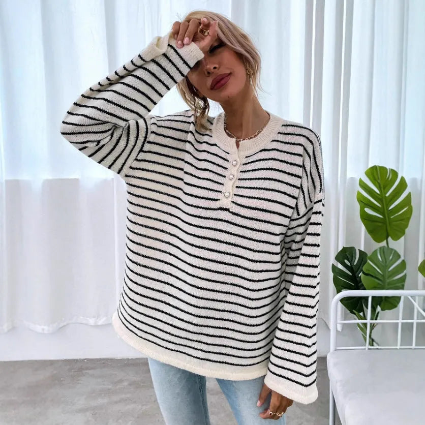 Black striped women's knitted top with drop shoulder sleeves and button detailing