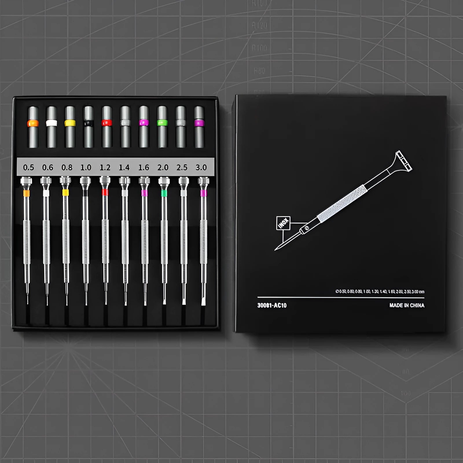 Watch repair tool set with 10 screwdrivers and 20 spare bits in boxed packaging