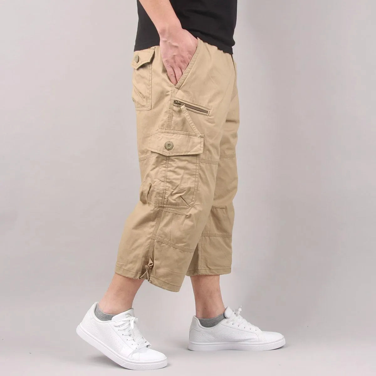 Man wearing loose khaki cotton cropped pants for sports