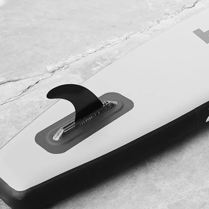 SUP paddle with large removable fish fins for stand-up paddleboarding