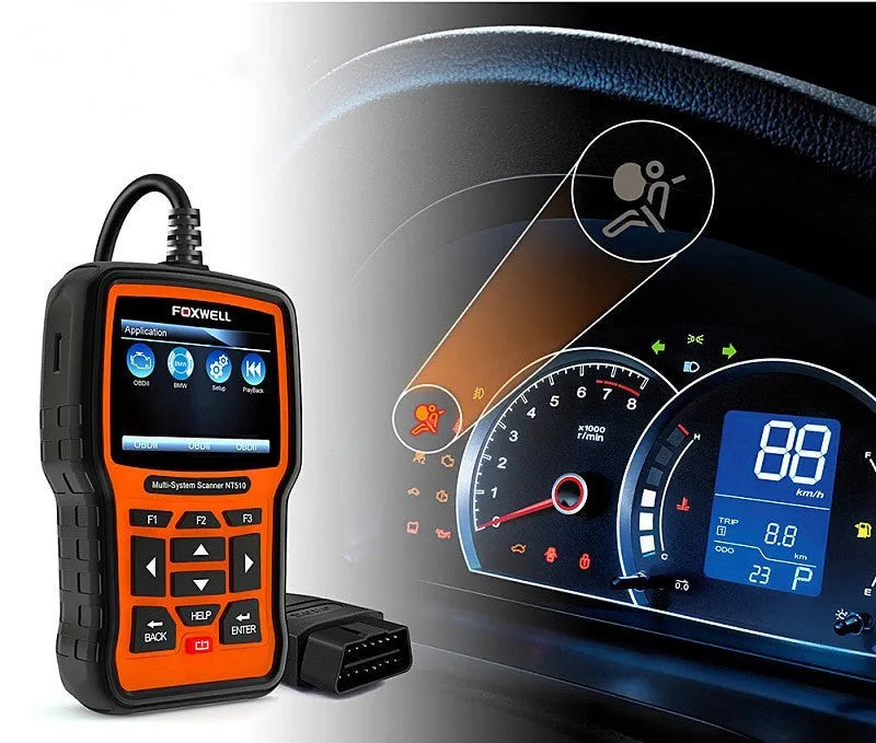 Foxwell NT510 orange and black automotive diagnostic tool with OBD2 cable