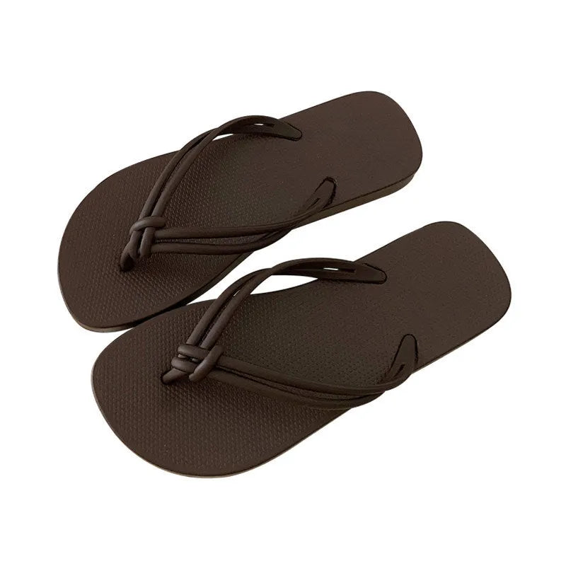 Men's PVC flip flops with toe covering design in various colours on white background