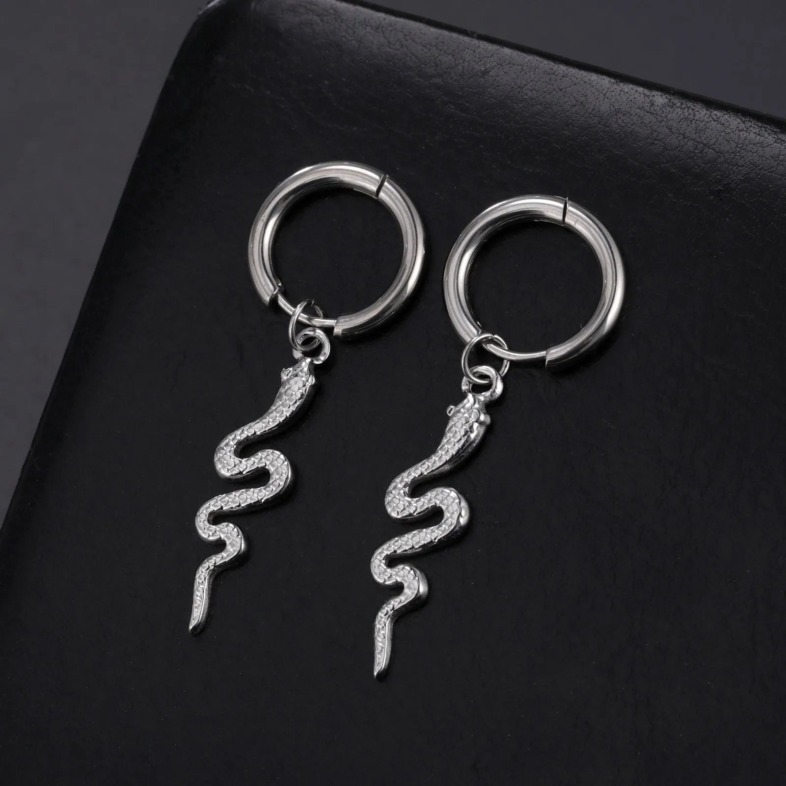 Gold plated stainless steel snake-shaped vintage clip-on earrings for women.