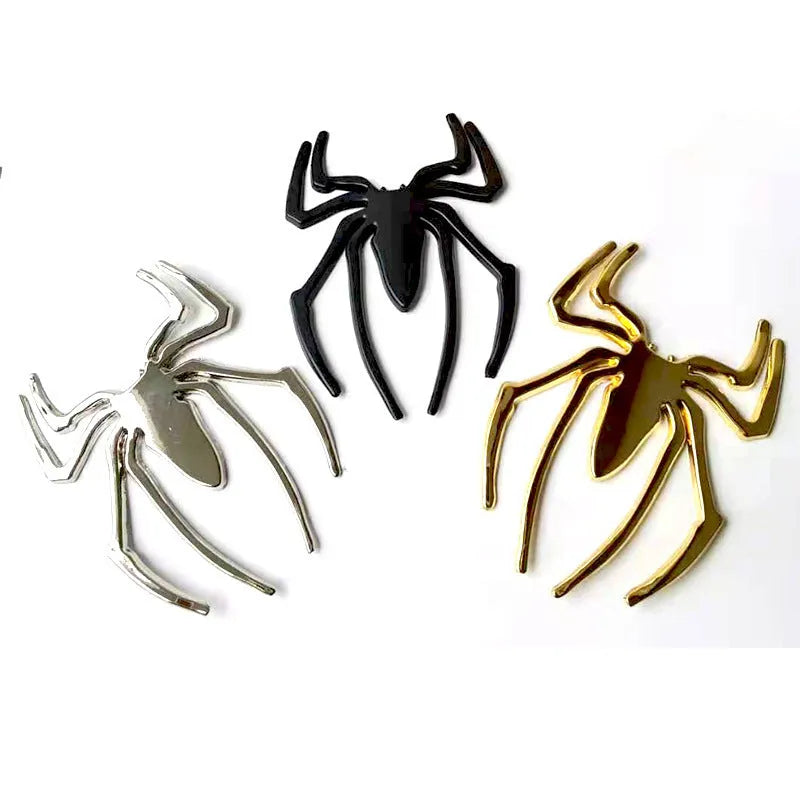 3D metallic spider bumper sticker in gold, silver, black, and red colour options.