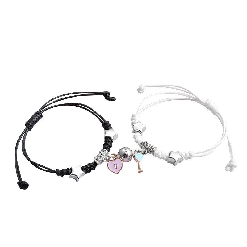 Alloy couple bracelets with magnet closure showing various design options including crown, clover, and text patterns