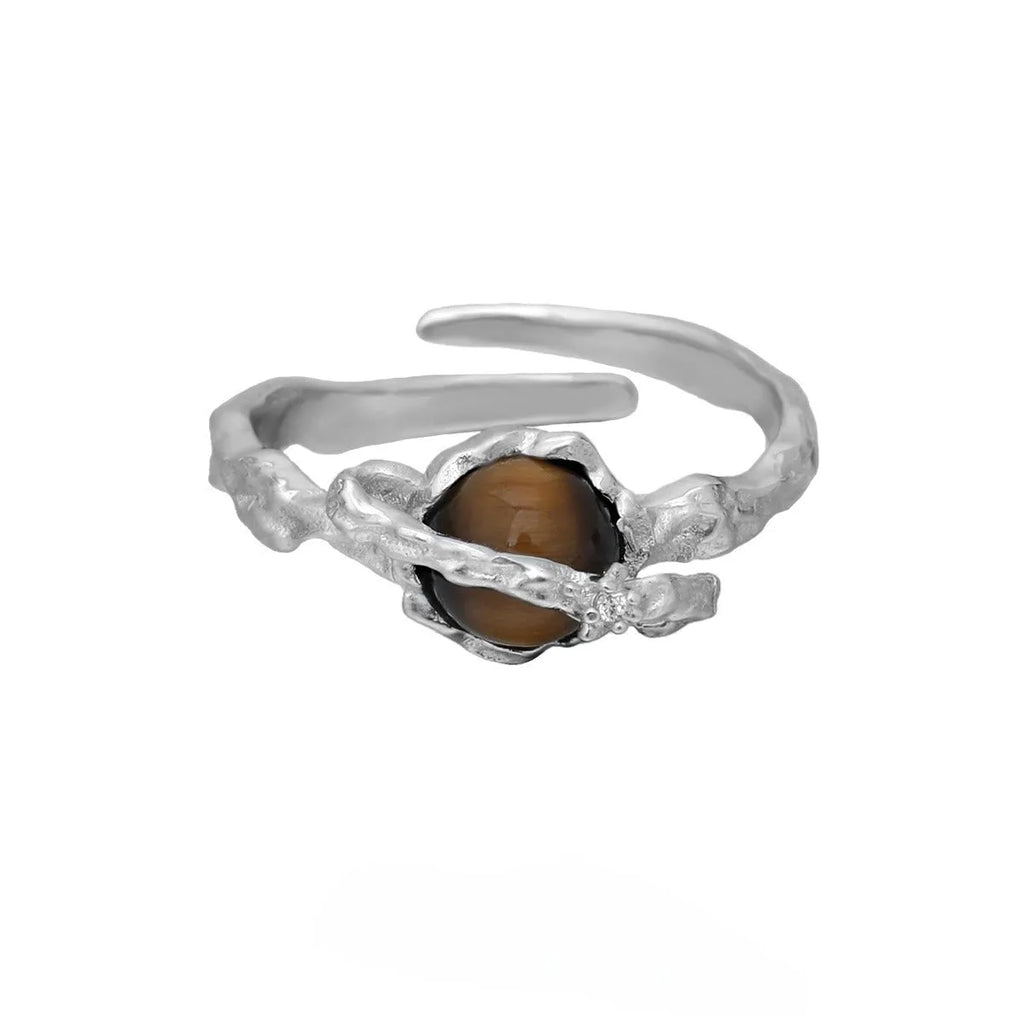 Adjustable opening Saturn ring in electroplated white gold colour with silver construction