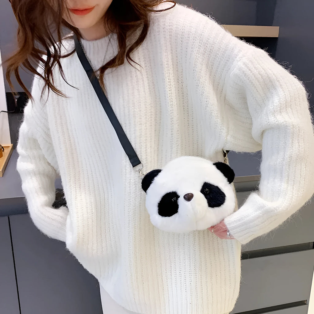 Plush cylindrical crossbody bag with panda design, showing sandwich pocket and shoulder strap