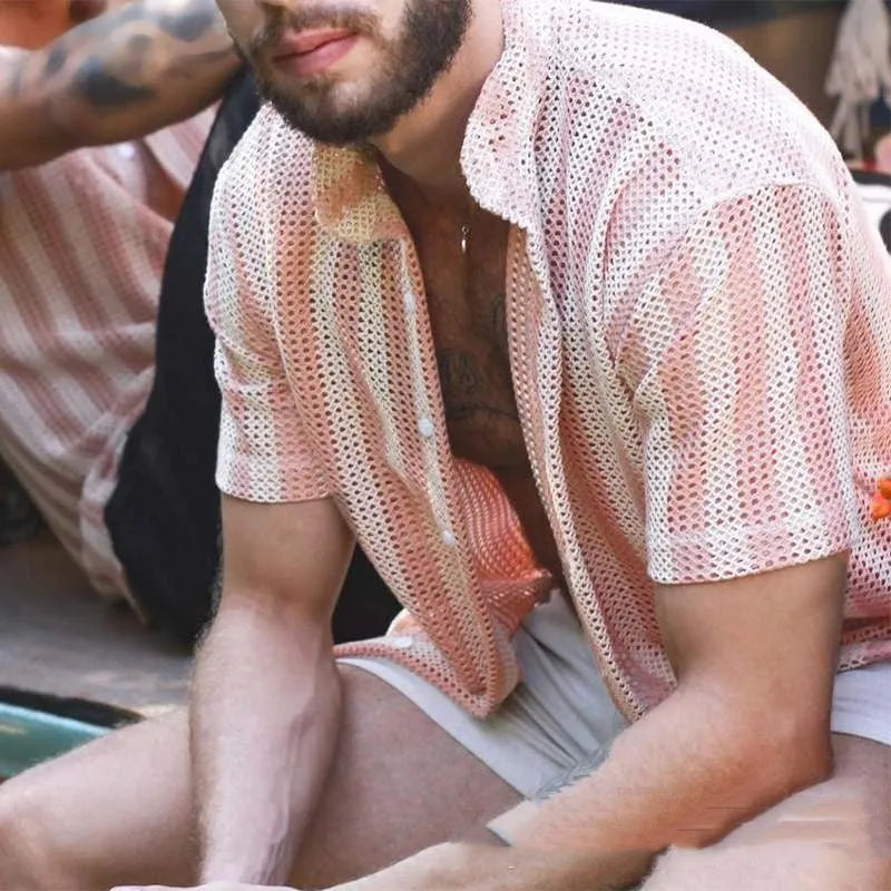 Pink men's loose-fit waffle knit short sleeve cardigan shirt on a hanger