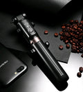 Aluminium alloy Bluetooth tripod selfie stick with remote control extended, holding a mobile phone.