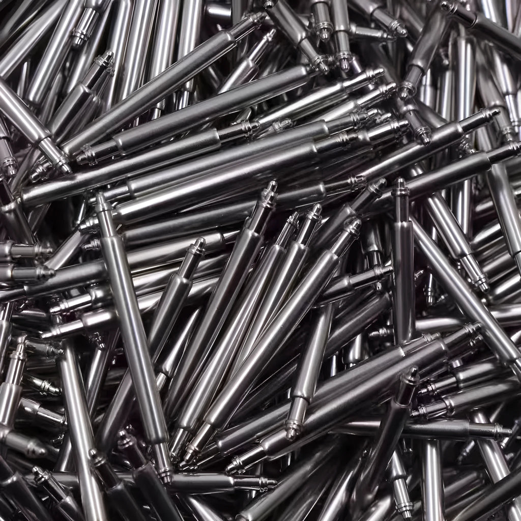 Watch auricular needle spring shaft component for repair in sizes 21mm to 26mm.