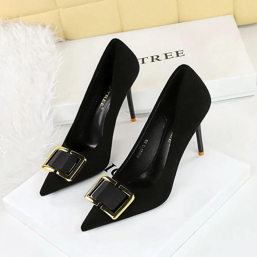 Black suede women's court shoes with a 9cm stiletto heel and pointed toe.