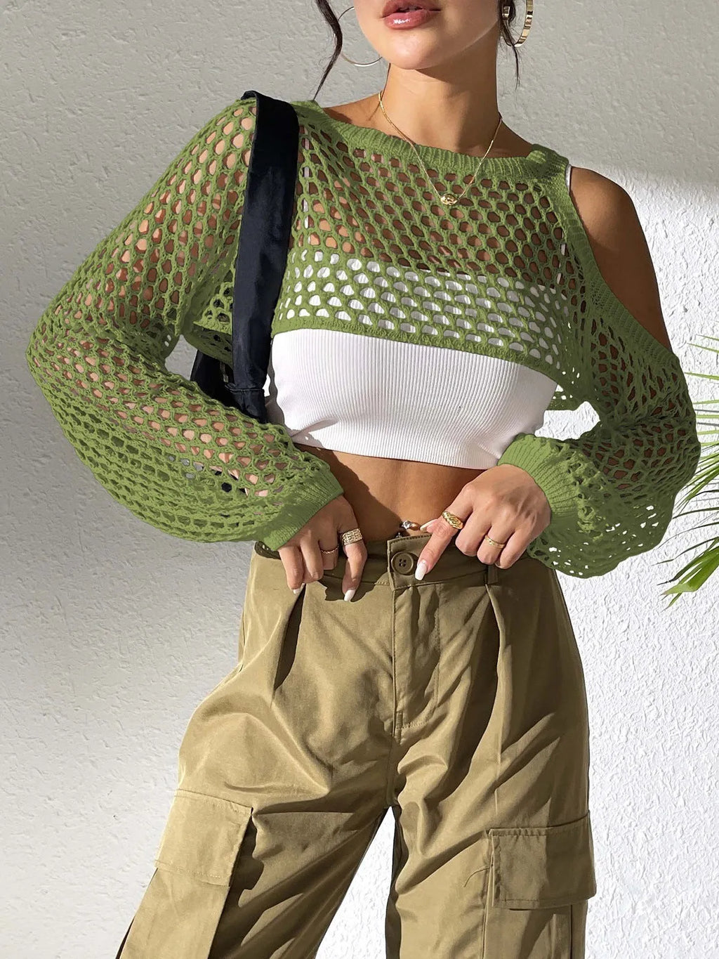 Sexy hollowed navel design mesh beach shirt shown in multiple colours including white, black, and army green.