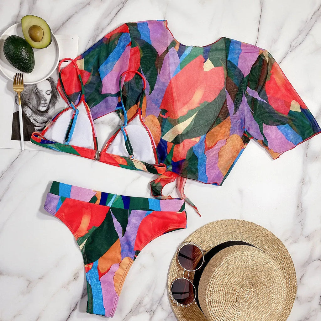 Red women's printed split swimsuit bikini made from nylon fabric.
