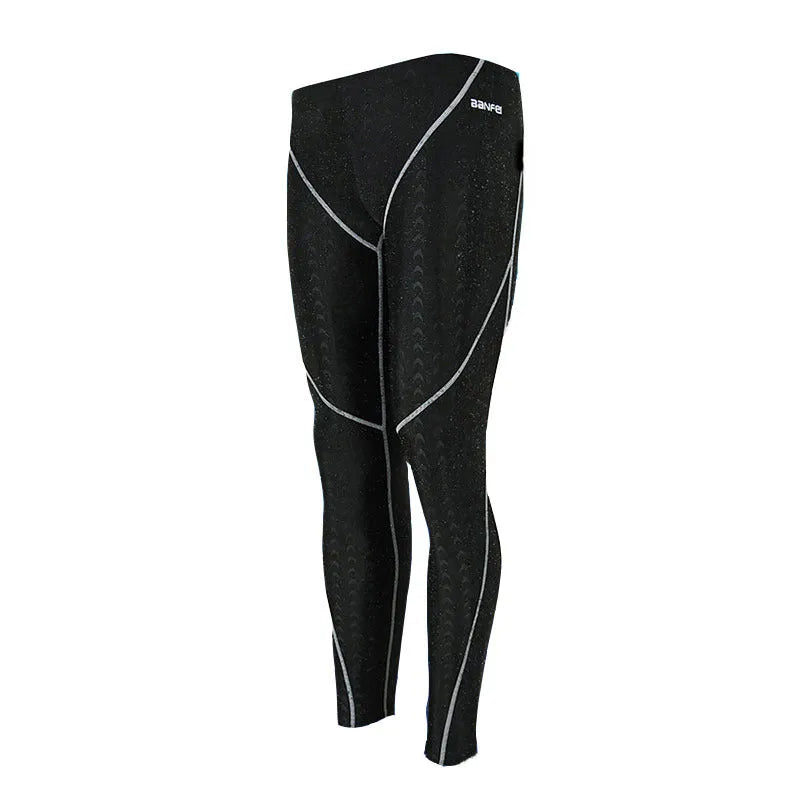 Men's black and grey line nylon cropped swimming trunks laid flat, briefs style.