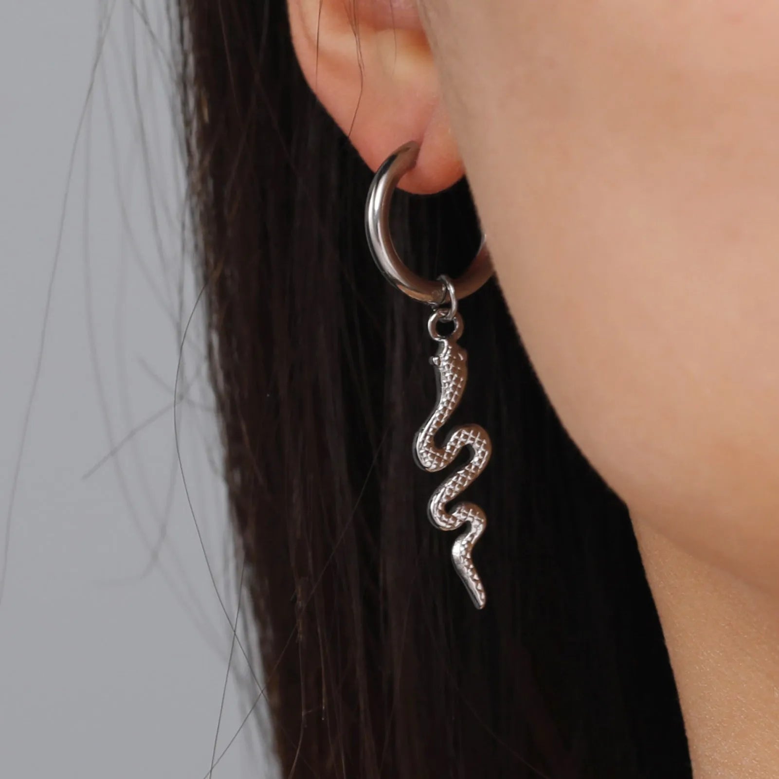 Gold plated stainless steel snake-shaped vintage clip-on earrings for women.