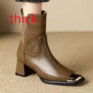 Brown cowhide leather Martin boots with a side zipper and low tube shaft.