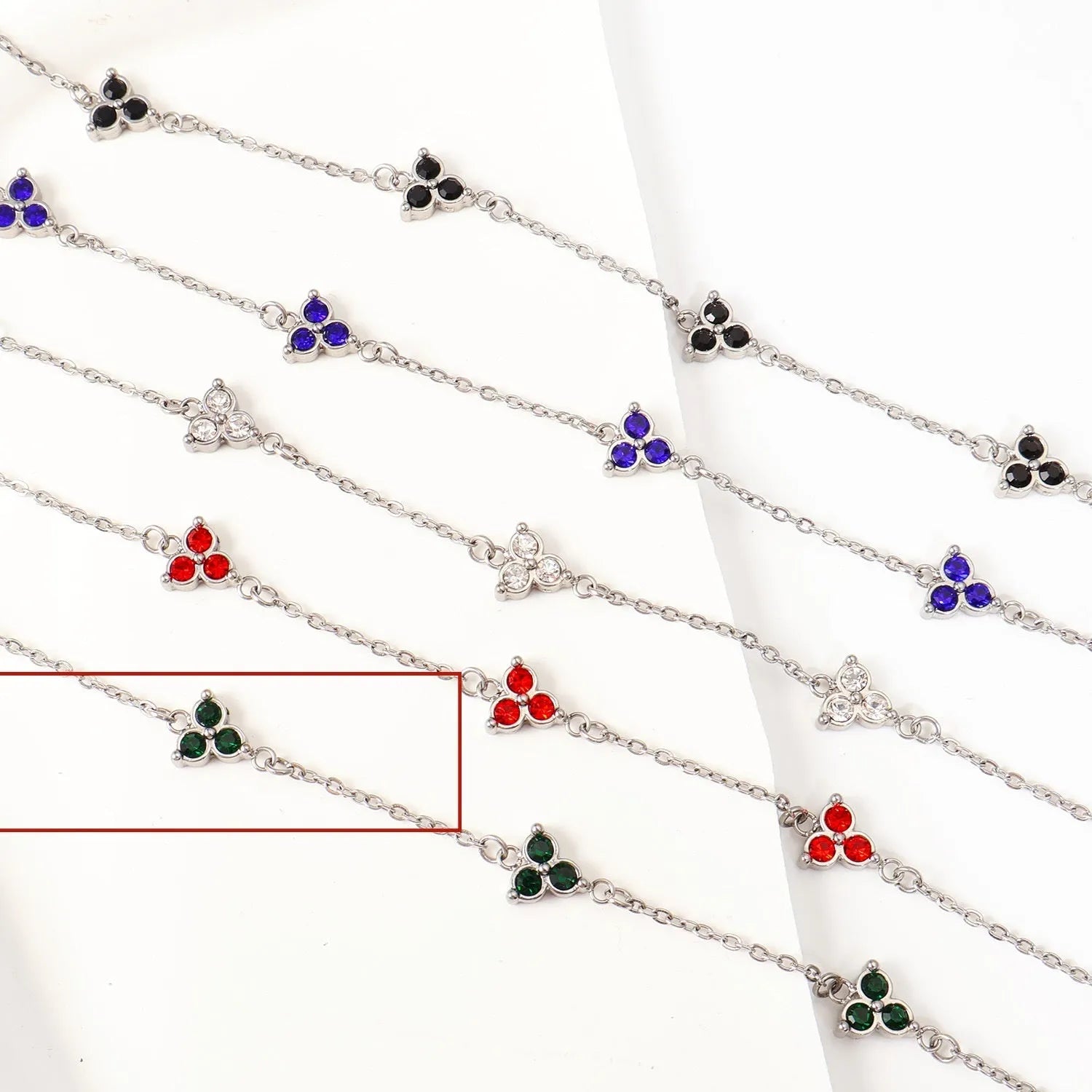Women's geometric bracelet with triangular diamond cluster in gold or steel stainless steel with coloured stones