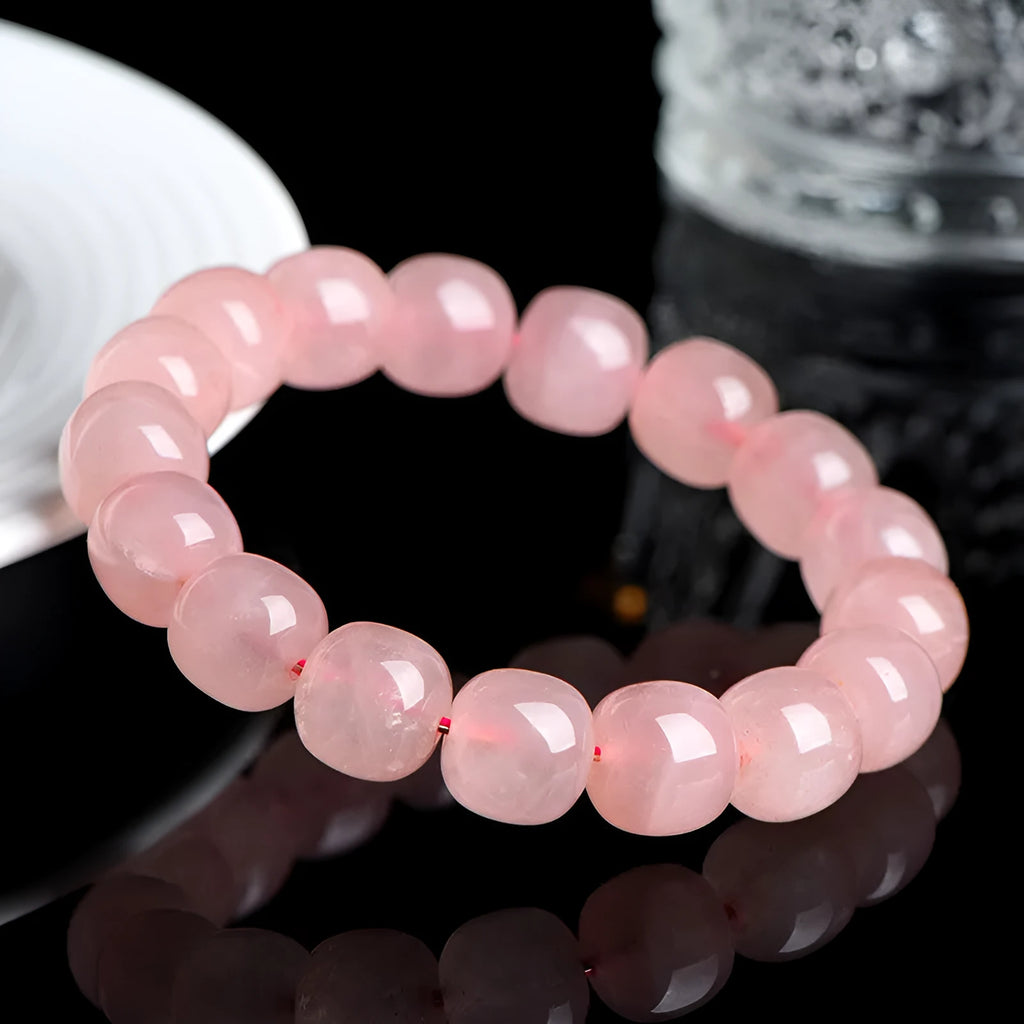 Pink crystal barrel bead bracelet with geometric shaped 8-10mm beads