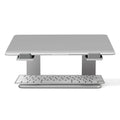 Black aluminium alloy laptop stand on desk with laptop elevated for cooling