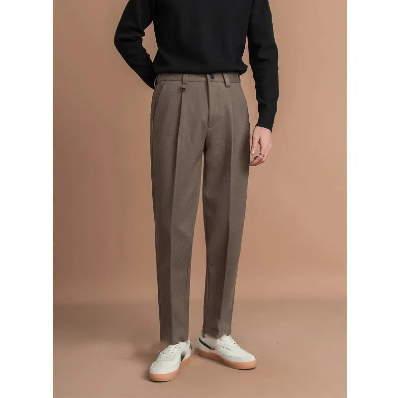 Men's straight leg casual business trousers in black, shown in a light business style setting.