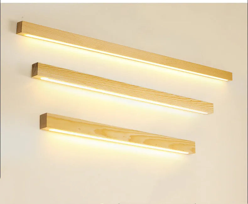 Modern walnut colour wood and acrylic strip wall lamp available in 60cm, 80cm, and 120cm lengths with LED lighting.