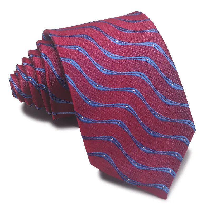 Close-up of a red, black, and blue striped men's formal tie with a textured Jacquard weave.