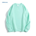 Women's loose fit cotton off shoulder sweater in a solid colour with round neck and long sleeves.
