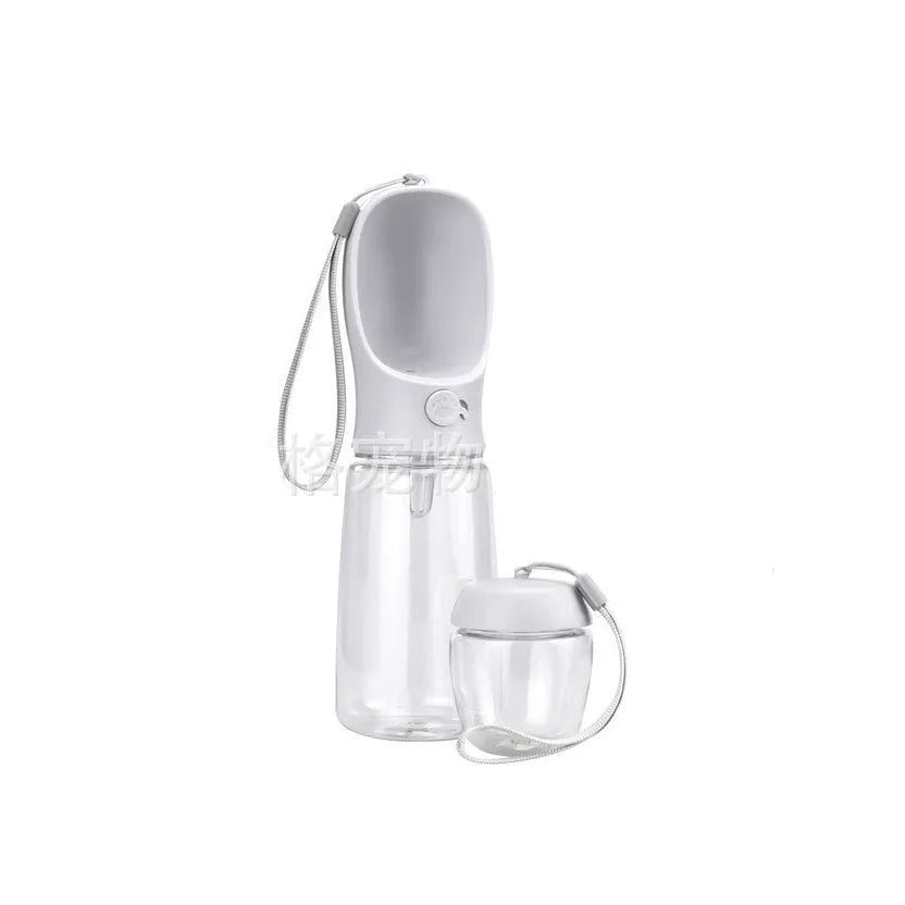 Blue portable plastic dog water cup with attached drinking bowl for outdoor use