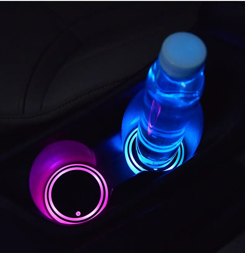 LED light-up coaster for car cup holders showing colourful illumination and 68mm diameter