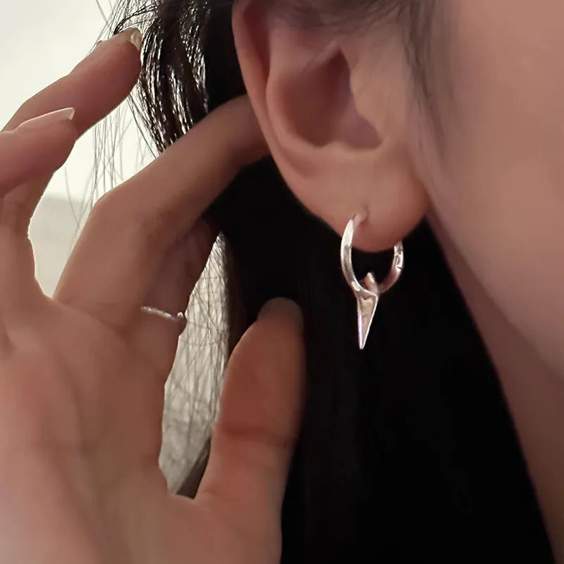 Geometric star shaped ear clips for women with copper construction and platinum electroplated finish