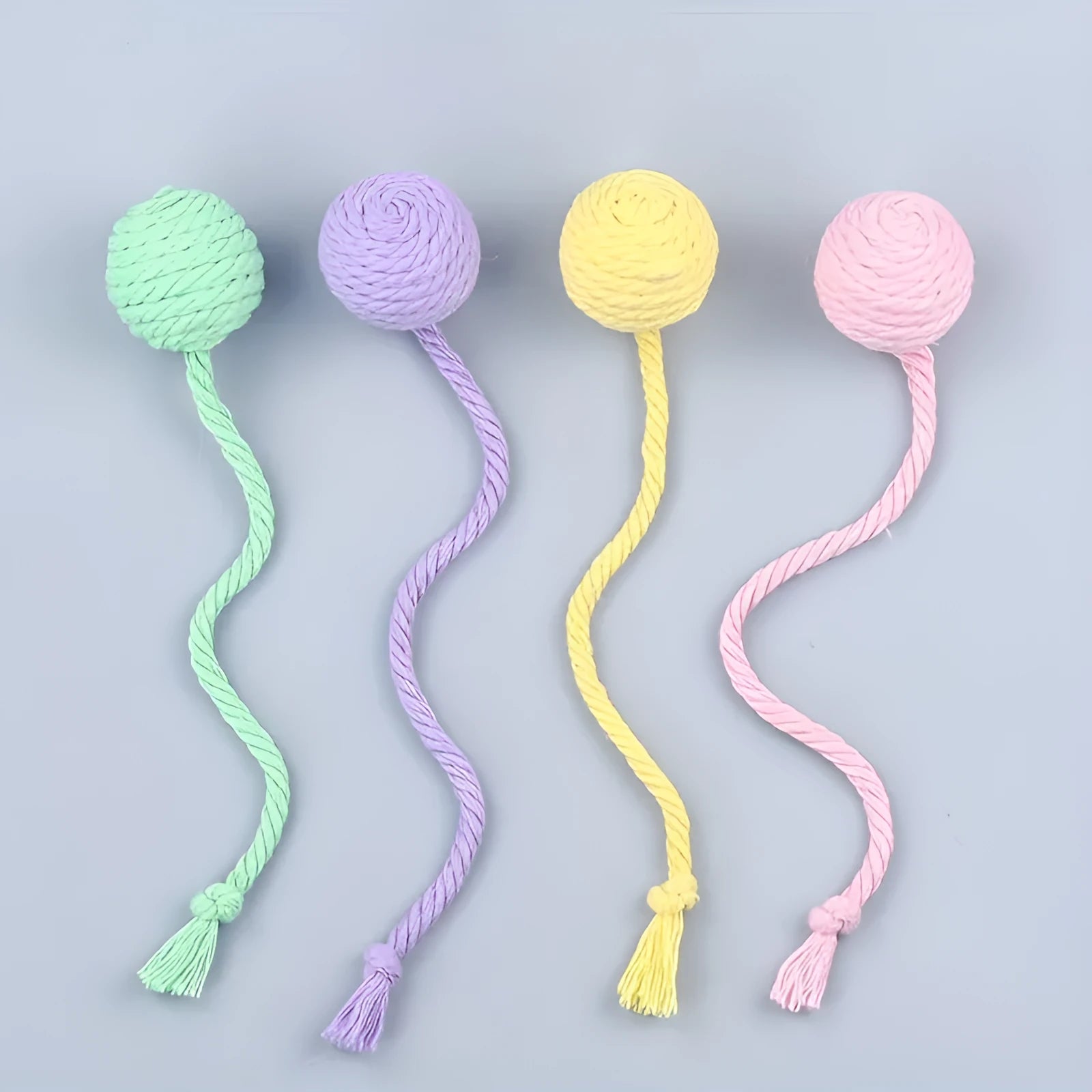 Colourful cat toy ball with rope and bell in green pink purple yellow options
