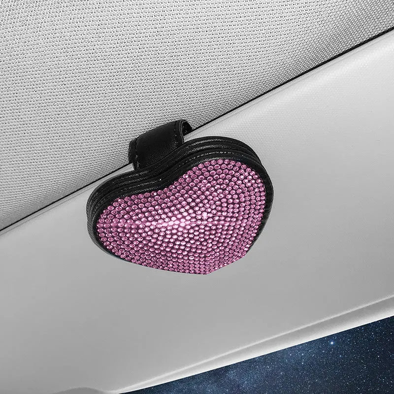 Black PU leather magnetic car sun visor clip holding sunglasses with a slot for tickets.
