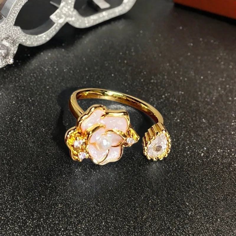 Adjustable copper gourd ring with flower and bow design in New Chinese style featuring inlaid zircon stones