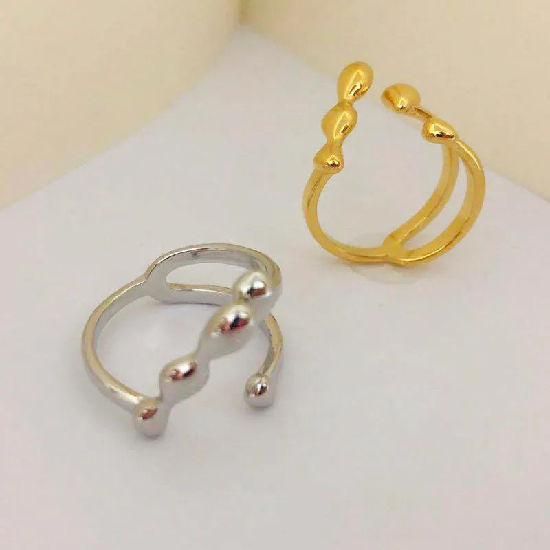 Brass women's fashion ring with spherical design in gold or silver adjustable ring