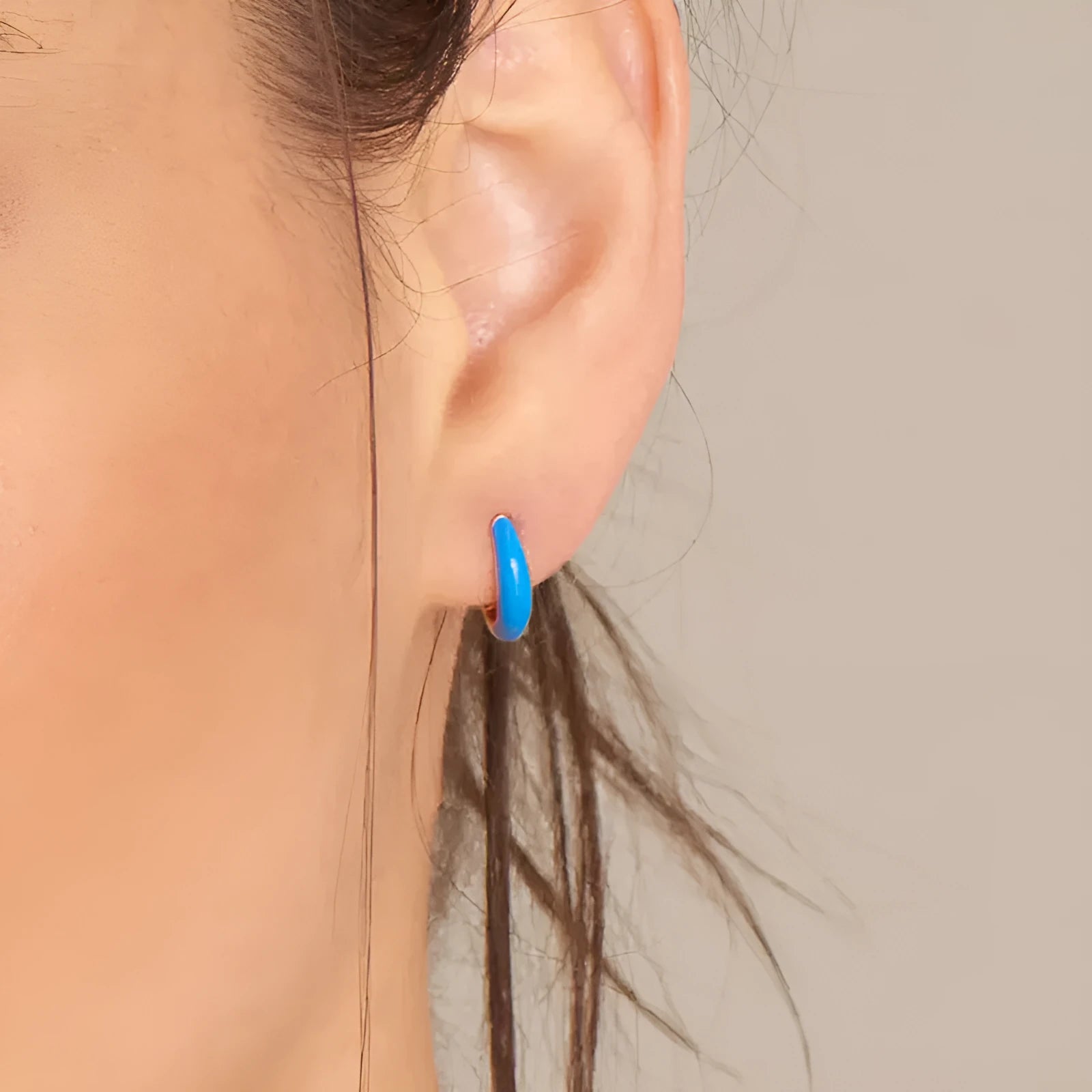 Geometric U-shaped silver earrings with an oval epoxy resin centre in a choice of seven colours.