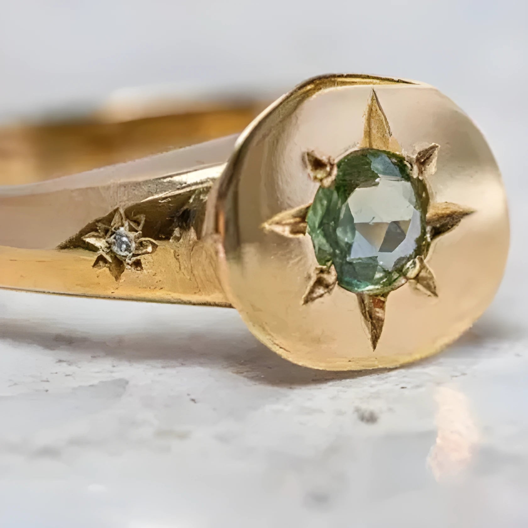 Golden adjustable ring with oval asterism zircon design and star shape