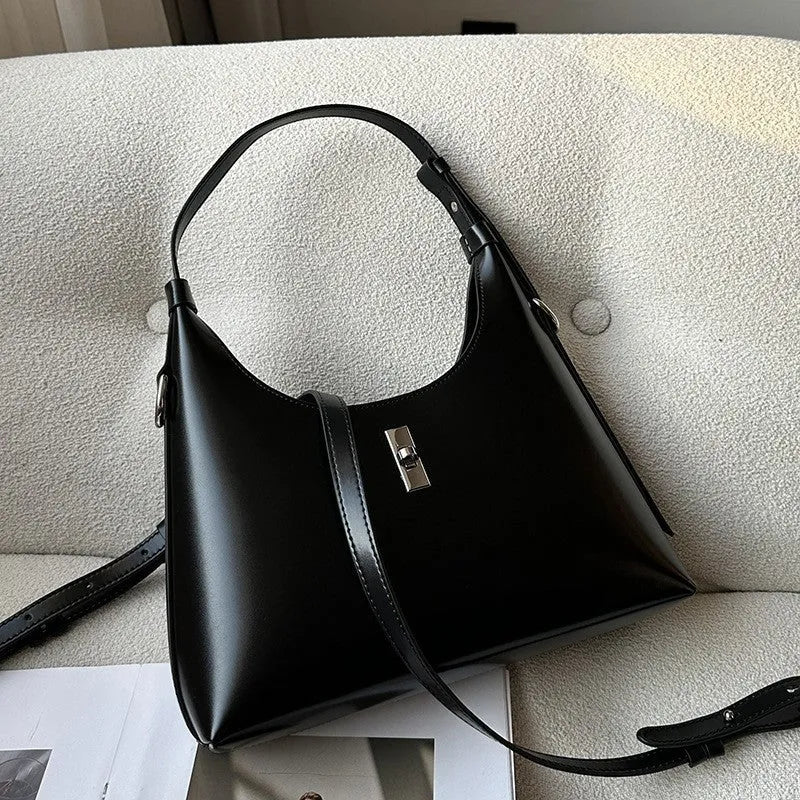 Genuine leather dumpling-shaped crossbody bag with multiple compartments in apricot colour