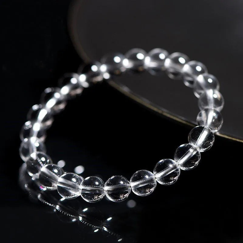 Natural Donghai crystal bracelet with round white beads, shown in a single circle design.