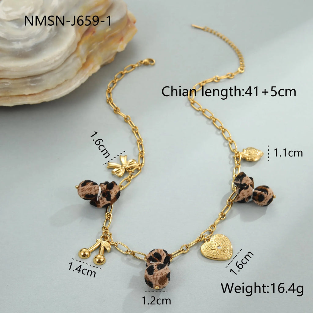 Women's stainless steel leopard pendant necklace with love heart and flower details on 41-50cm adjustable chain