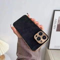 Leather texture phone case for iPhone shown in black, blue, grey, and grey-green colours.