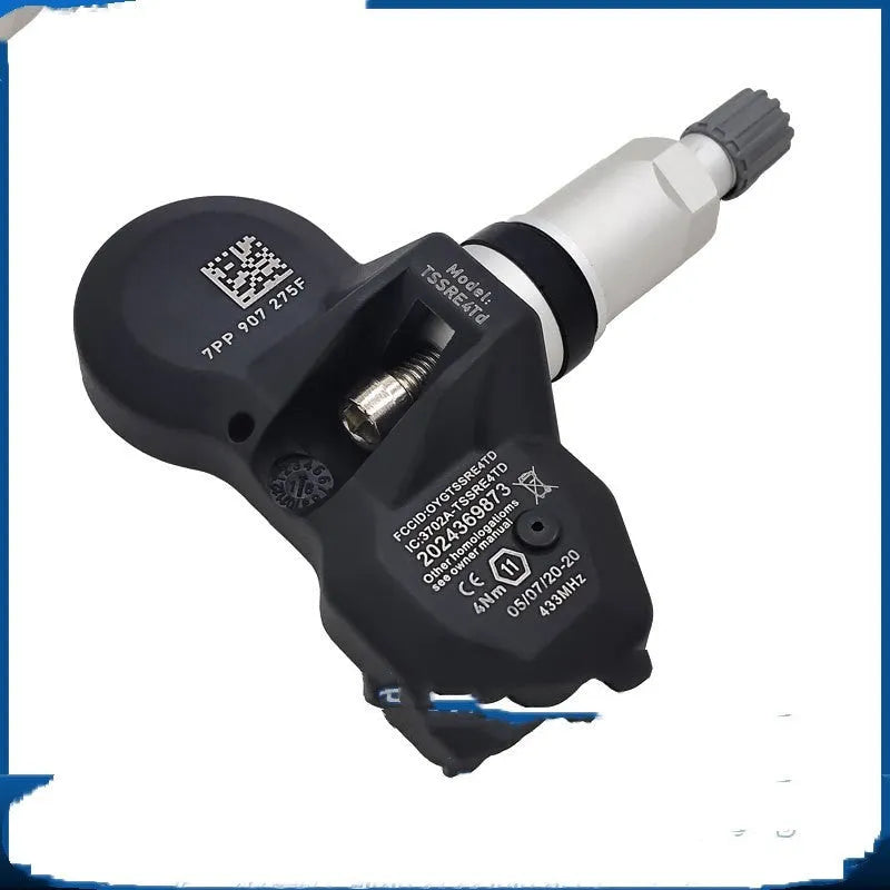 Black Audi tyre pressure monitoring system (TPMS) replacement sensor unit