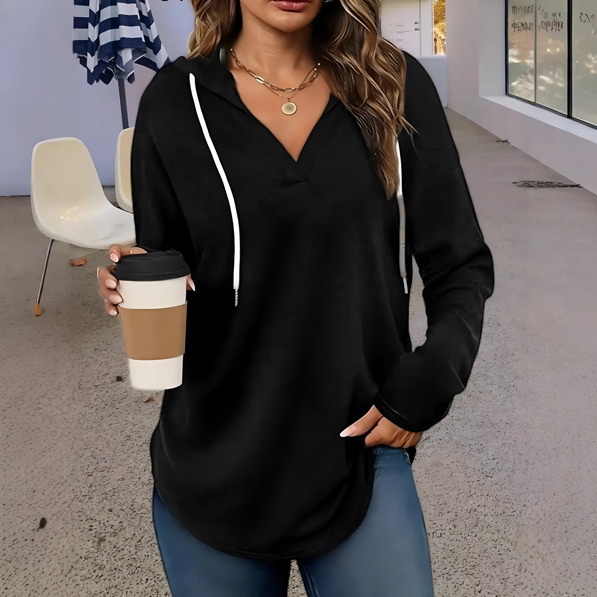 Women's V-neck hooded sweatshirt in black or red with long sleeves and loose fit