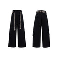 Men's dark blue straight-leg cotton jeans with heavy stitching on belt and zip decorations, shown in a loose fit.