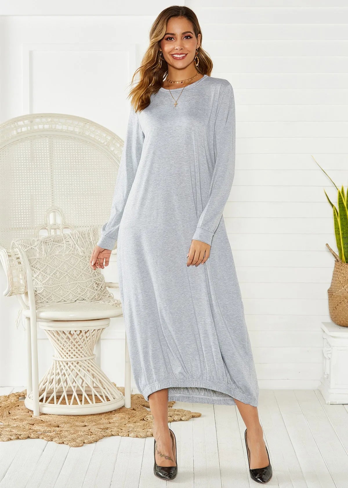 Loose lantern dress with lace-up crew neck in black or grey polyester knit fabric