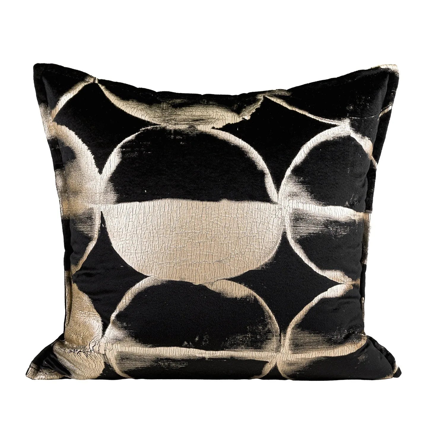 Black and gold abstract patterned decorative cushion on a sofa, available in three sizes with a removable cover.