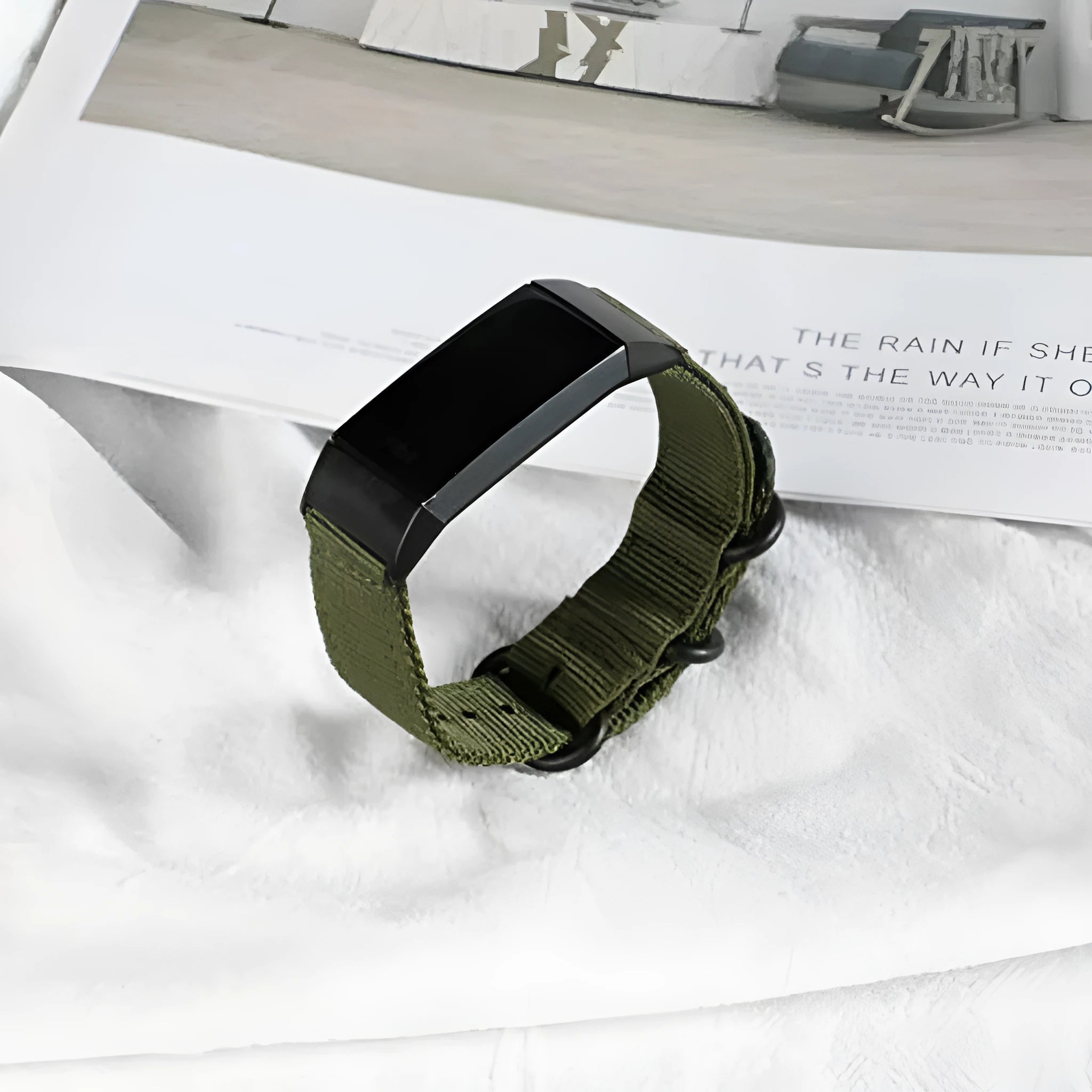 Nylon replacement strap with buckle for Fitbit Charge 2, 3, 4, and 5 fitness trackers.