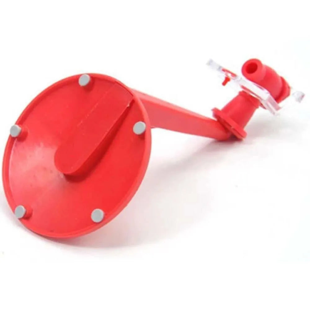 Red plastic Magic Tap soda dispenser attached to inverted 2 litre bottle